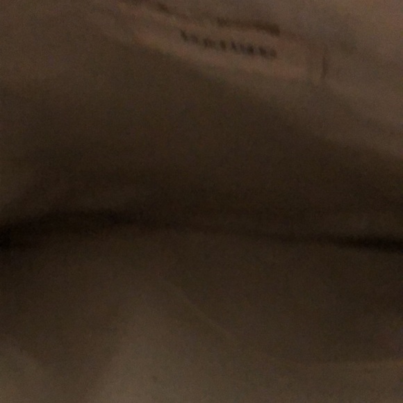 Mango clutch. Textured geometric pattern. Zip top w/ black grosgrain ribbon pull - Picture 9 of 11